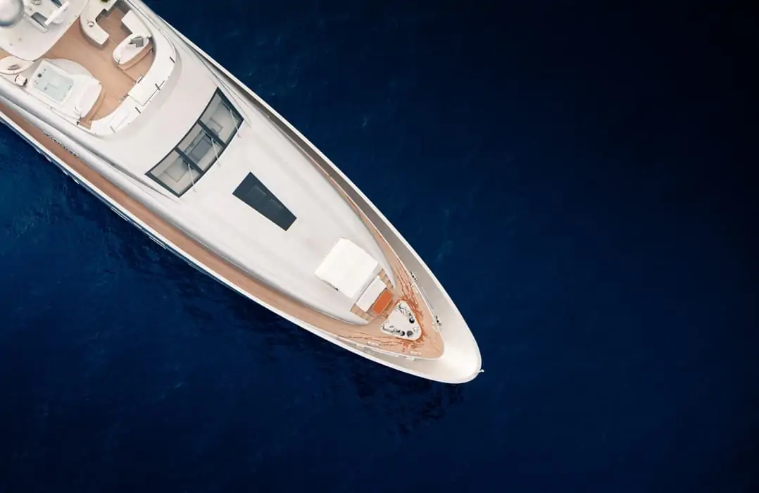 superyacht on dark blue water